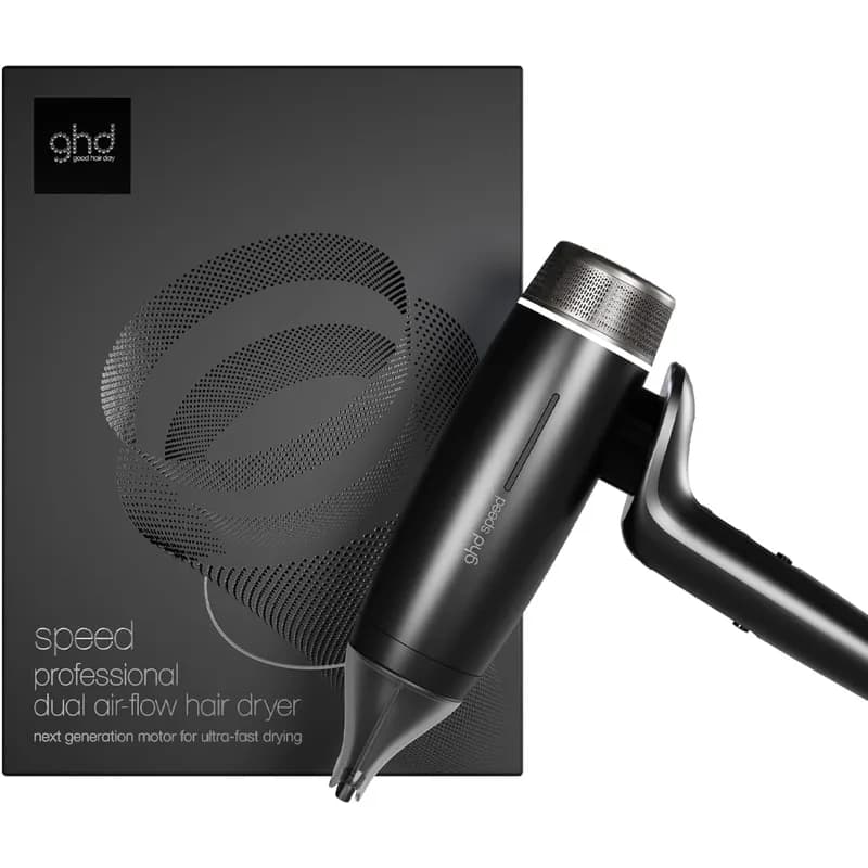 ghd Speed hair dryer in titanium black in front of its box