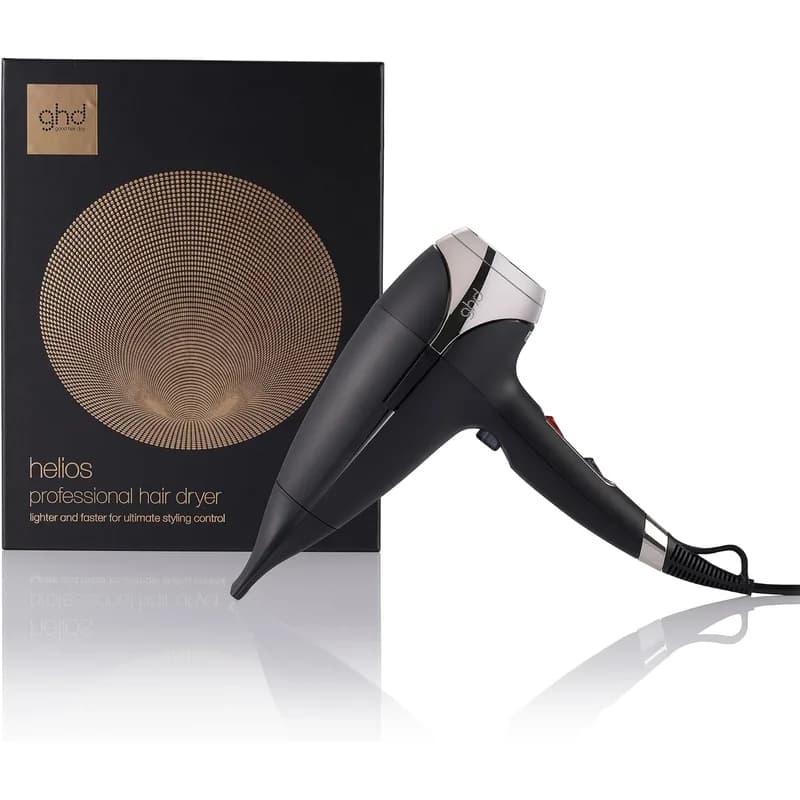 ghd Helios hair dryer in black in front of its box